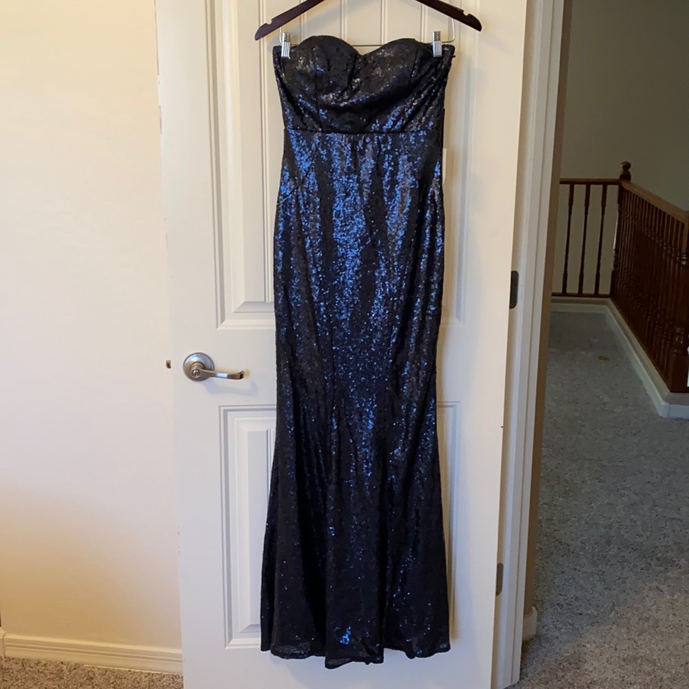 Gorgeous sequined blue floor length dress.